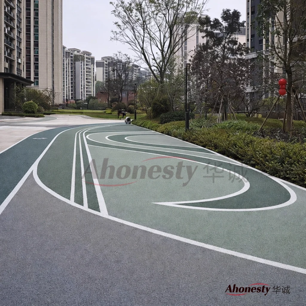 Colored cold mix asphalt road surface with durable line marking in residential area